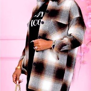 These amazing plaid black, white and brown jacket/coat great wear for fall.